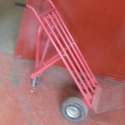 red sack truck that can be tilted like in pic its in fair condition 10 pound CASH ON COLLECTION