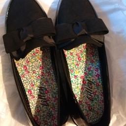 Brand new and unworn - Sticker still on the bottom - Bought for a little lady but they are too small - Brand LILLEY - Size UK 4 - Velvet feel bow - Suede feel top - Shiny body -Tiny block heel, almost flats - Perfect soles as only tried on in the lounge
