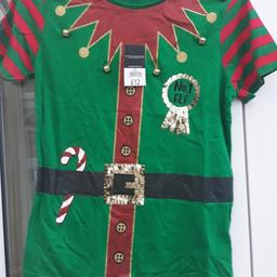 Elf top, measures 34" chest. So possibly fit size 10. Never worn . Bells on front actually jingle. Collect or can drop off if local to wv11.