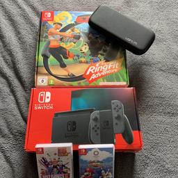Grey Nintendo switch like new no scratches plus ring fit adventure game just dance 2019 game and mario and sonic Olympics game  plus carry case  collection only