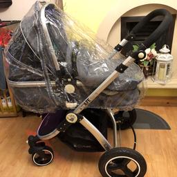 ISafe pram with Maxi Cosi car seat. Immaculate condition. Comes with rain covers for pram and car seat. Also has pram clip and cosy toes for both.
