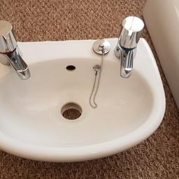 ideal standard, includes hot cold taps and plug, basin H14xd25.5xw35cm, pedestal H68xD14xW15.5 cm, all in working order.