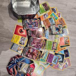 tin bundle including zacian V + 4 booster packs and over 100 cards