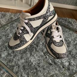 Jimmy choo glitter trainers 👟 immaculate condition never worn. Size 40 purchased as a gift but didn’t fit.  Copy of receipt available for proof of authenticity.