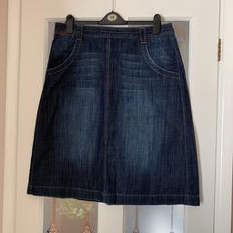Casual good quality Denim Skirt. Suitable for all weather conditions. Length 67cm. Zip detail to back with loops for belt, pockets to front with small waist pocket