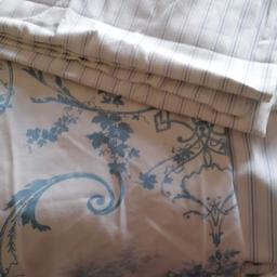 These are dorma blue and white curtains 90 drop with king size bedding. Curtains have a slight sun fade on edge but can't see when hung up