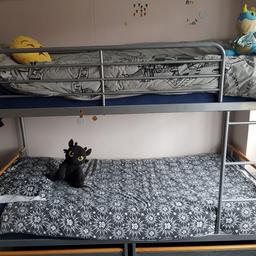 silver bunk beds in good condition. it comes with 2 pull out draws at bottom. there is even a tray for the top of the ladder. it comes with both mattresses. selling due to moving.can deliver at an extra cost