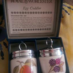 selling beautiful pair of Royal Worcester egg coddler ,come with Directions for use,brand new never use come with original box ,just beautiful colour and with silver top bargain good for collector