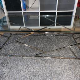 Glass chrome coffee table - perfect conditon only selling due to needing more space. Looks beautiful in the living room.