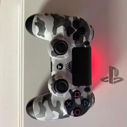 Official Sony DualShock 4 with Arctic camo design.

Very good condition, NO stick drift or wear.

USB cable not included.