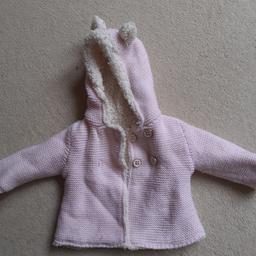 Gorgeous, fleece lined. so warm and cute with ears on the hood. lasted beyond 3-6 as generous sizing.