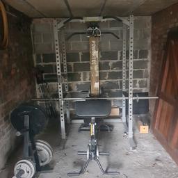 powertec gym 

power rack with dip bars, pull up bars 
latt pull machine 
bench 
weights 
arm curl 
weights 
Olympic bar 
wight stand 

around 2ks worth of equipment
