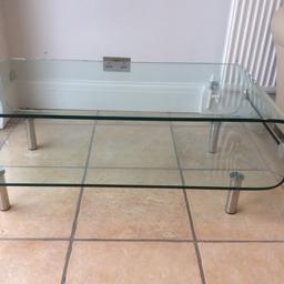 Modern tempered glass and chrome Coffee table in excellent condition. 55x110x42 cm WxLxH Buyer collects.