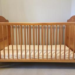 FREE- Wooden cot bed. Has two levels for infant and lowered (as in picture) to toddler. Very good condition. General wear and tear marks. Dismantled for collection.