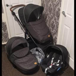 Includes carry cot, stroller, and car seat. Rain cover also included. In very good condition. Collection only.
