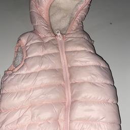 9-12 months 
Baby girls gillet / body warmer 
Fleecy lining very warm and snug 
Perfect for the autumnal months 
Very good condition 
Pet free smoke free home 
Collection Le36sa 
Happy to consider local delivery or post at buyers cost
