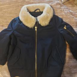 Like new condition, dark navy with cream fur collar,  worn once.