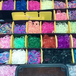 hundreds of loom bands,  various colours. 