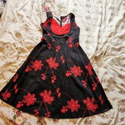 Lovely rockabilly 50's style retro dress, black with red flowers.

collection WV8