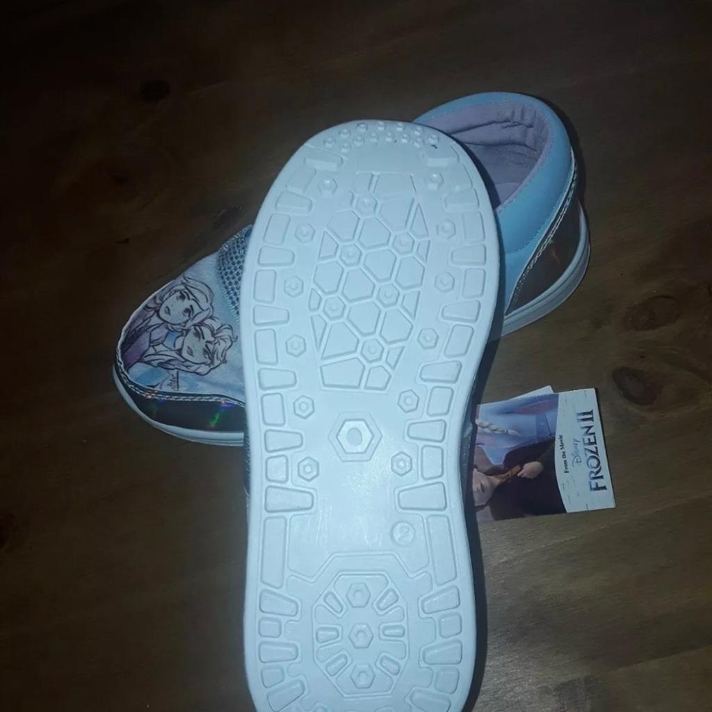 Girl’s Frozen 2 trainer. Size-2 . Brand new still attached tag. Smoke, Covid and pet free home collection or postage with postage cost. Thanks