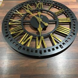 Large wall clock 2ft in diameter 
  Ballys brand 
    In excellent working order 
       Buyer to collect