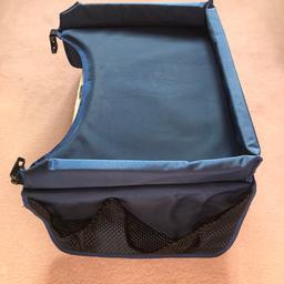 Blue play tray with handy storage pockets each side. Ideal for use in car. Strap is missing because it was never used. From a smoke and pet free home. STRICTLY COLLECTION ONLY