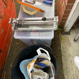 Most bits used. Clearing out garage due to moving house. 600mm score/snap tile cutter, adhesive floats, grout float, tile file, 2mm spacers. Everything needed to complete some DIY tiling.