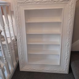white display shelves , beautiful solid unit , it has a wire at the back if you wish to hang it off this , the overall frame measurements are 30inches x 42inches if you need more information please ask away, pick up only .