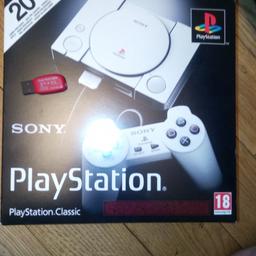 PlayStation classic with 20 built-in games plus a a flash drive 128gb with hundreds of games great  Christmas present new inbox