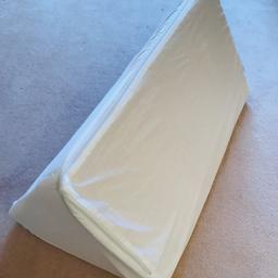 Triangular support pillow. Has zipped removable cover which has been washed.  Approx 25” x 12” high.  STRICTLY COLLECTION ONLY