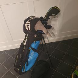 kids golf set, would suit 60" - 64", approx upto 14years. decent condition for age, missing a couple of head covers. set inc driver, fairway, rescue, Pw, SW,  8,5 and a us kids 7 and ping putter. included is a ping towel and novelty shark head cover. this set cost £450 new and is still this price in shops.