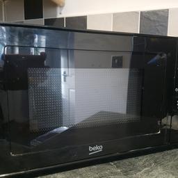 Beko compact 700W black microwave oven. 6 months old. Good working order.