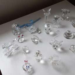 I am selling a range of glass crystals I was sold as Swarovski  but not .The odd one has been glued  three you can glue but the rest in good condition 24 in total