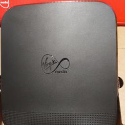 used virgin broadband hub/ router. comes with ac adapter in original box.