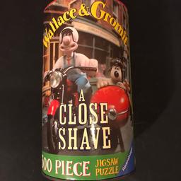 Brand new as never opened Wallace & Gromit “A Close Shave” jigsaw puzzle. 500 pieces. Pieces are in original sealed bag - see second photo.  Puzzle size 49cm x 34cm (19 1/4 x 13 1/2 inches).  From a smoke and pet free home. STRICTLY COLLECTION ONLY