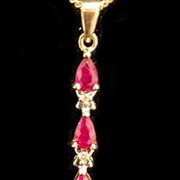 Stunning Ruby and diamond pendant on a nice long chain ( see pictures ) 
Tracked signed for and insured via Royal Mail 
Please check my other items for confidence 
Delivery possible / collection welcome