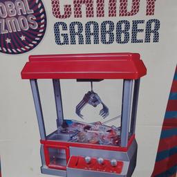 candy grabber arcade.
Working perfectly.
boxed.