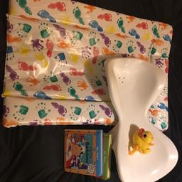 Bath time bundle includes newborn bath seat with anti slide system, changing mat, winding yellow bath duck that swims in water and bath book+ extra mealtime book.
For lots of similes time.
