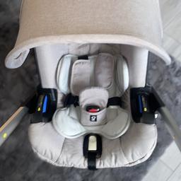 The only car seat in the world that turns into a stroller with the click of one button. Chassis is immaculate, no scratches like new. Wheels have near enough full tread. No stains at all. There is slight fading to the hood (pictured). This is purely cosmetic and price reflects this. Doona have confirmed they sell complete new fabric sets in a range of colours. I have lost the newborn head insert so only the bottom bit is with it, Doona sell these for less than £20. Rain cover is also included.