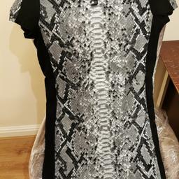 MK Michael Kors Black Jewelled Dress in size L/Large
Used a couple of times so as good as new
Size L
RRP £95
Slightly stretchy
Zip on the back
You can double click on the images to open them in full view
Nice jewelled detail on the neckline
From a clean pet and smoke free home
Please check my other designer items
Postage via 2nd class recorded delivery 
Thanks