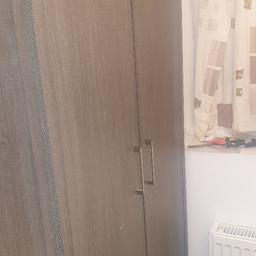 NEARLY NEW WARDROBE 
DARK GREY
INSIDE RAIL/SHELL/DRAWER
IN SPARE ROOM
SMOKE AND PET FREE HOUSE