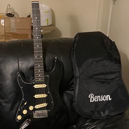 Benson left handed guitar brand new with scratch guard still on with beech headstock and padded gig bag