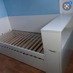 Ikea flaxa single bed with pull out bed underneath. Includes tv stand at one end and storage shelf and pull out book shelf at the other end. Great for kids. Very good condition
