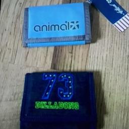2 x brand new wallets. One Billabong one animal.