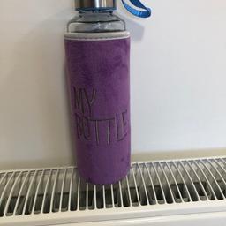 Brand new glass water bottle...no tags...glass...handle...nice cover...collection only.