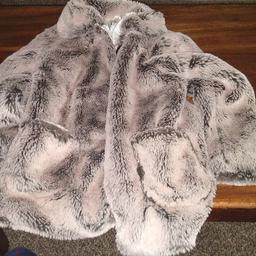 lovley light brown girls furry jacket 7 to 8 years old excellent condition let free smoke free unmarked