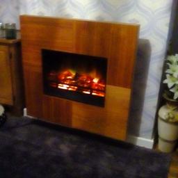 Fire place is in good working order solid wood 95cm wide 90cm high with wall bracket only reason for sale in small bungalow its to big for us can deliver locally