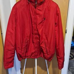 BRAND NEW NEVER WORN WITH TAGS
SIZE LARGE, RED WITH BLUE LOGO TO CHEST, HIDDEN FLAP HOOD WITH DRAWSTRING FASTENING, MENS, POLO RALPH LAUREN STRATFORD WINDBREAKER PADDED JACKET. DRAWSTRING FASTENING TO WAIST, BUTTON POCKETS TO FRONT.
DOES NOT INCLUDE POST OR DELIVERY IN PRICE
FROM A PET AND SMOKE FREE HOME
PLEASE SEE OTHER LISTINGS