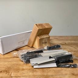 Unwanted gift
Knife Box only opened to photograph 
13 piece includes knife sharpener
Heavy bamboo wooden block 

Over 18s only

Collection Tooting Bec