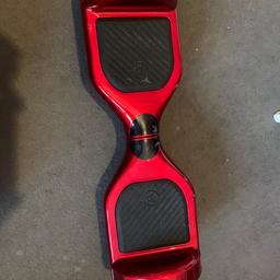 Excellent condition hoverboard. Used twice. Metallic red. RRP £300.
